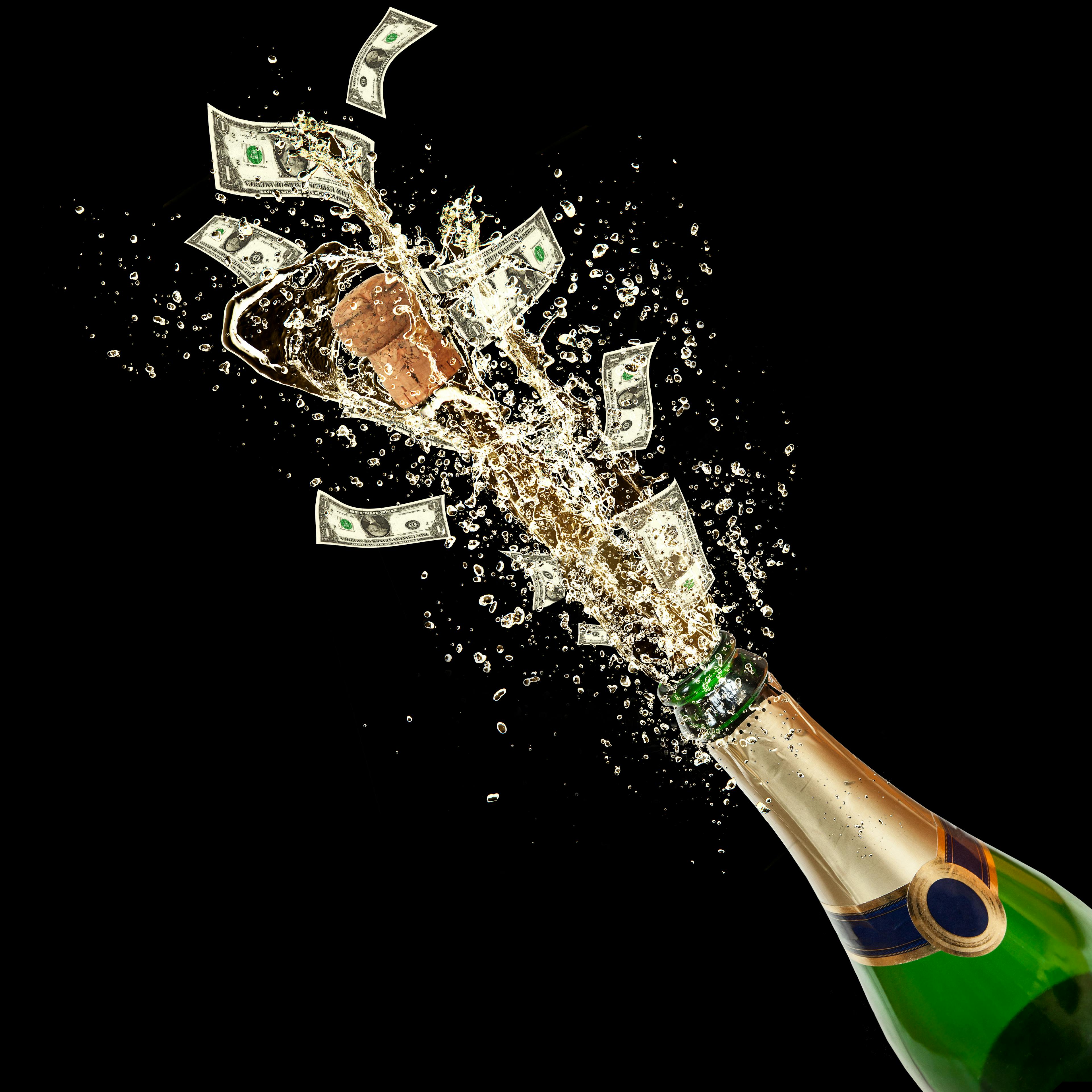 A bottle of champagne bursting open and money flowing out