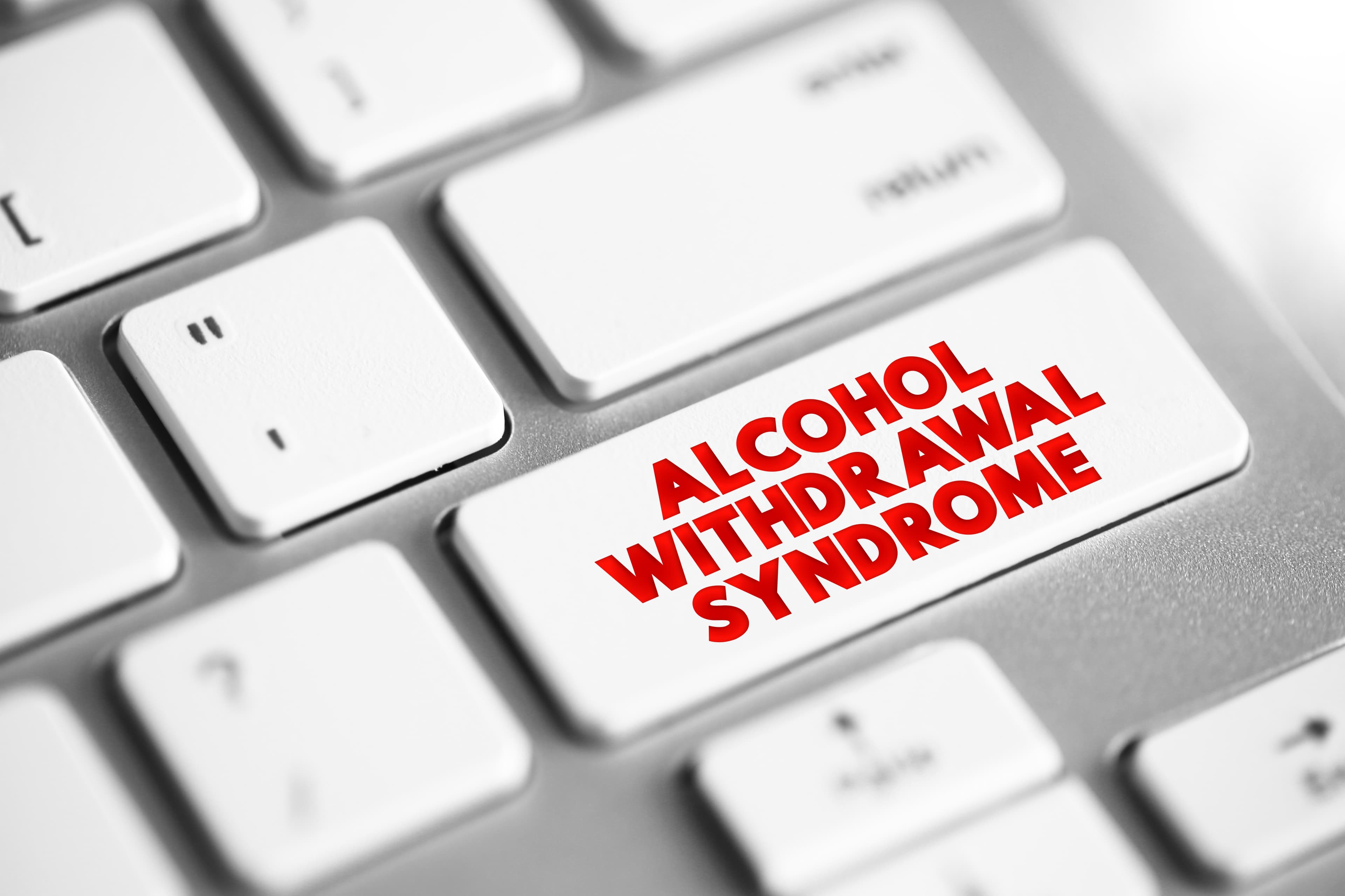 "Alcohol withdrawal symptoms" button on a computer keyboard